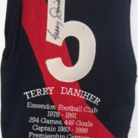 TERRY DANIHER Essendon Football Club Tribute JUMPER - signed by Daniher with embroidered stats - Sold for $146 - 2009