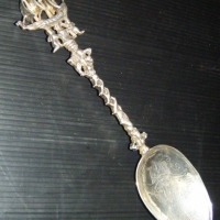 Large Sterling Silver decorative commemorative SPOON - ornate handle featuring 3 dimensional sailing ship to top - engraved with 4 quartered Lions ram - Sold for $85 - 2009