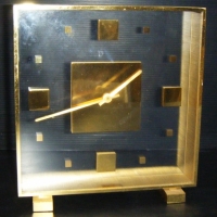 Stylish brass & glass LOOPING battery operated square TABLE CLOCK - Sold for $55 - 2009