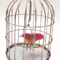 Fab Vintage Singing Bird in Metal Cage, (battery operated) Knob for playing different Tunes and OnOff Interval Knob, Made in Japan - Sold for $110 - 2009