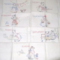 Set of 7 x fab vintage linen TEA TOWELS each embroidered for day of the week with KOALA doing daily tasks, washing, cooking, cleaning etc - as new - Sold for $92 - 2009