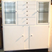 Vintage MedicalDental Cabinet with Cupboards to lower section, 6 shallow drawers above and bevelled glass doors to either side 112 cm high - Sold for $122 - 2009