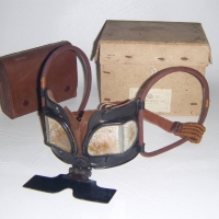 Original WW2 Pilots Goggles Mark IVB in original Box and Leather Case containing spare lens, bakelite container etc - Sold for $110 - 2009