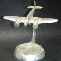 Vintage chrome ashtray with a Bowfighter on stand - Sold for $171 - 2009