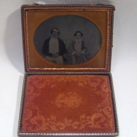 Large 14 plate AMBROTYPE portrait PHOTOGRAPH of couple with hand gilded HIGHLIGHTS - full embossed LEATHER covered case - c 1860s - Sold for $79 - 2009