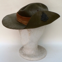 WW11 Slouch hat - Dated to inner - Orig Rising Sun badge and Regimental Patch - Sold for $171 - 2009