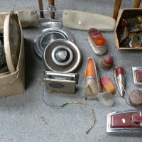 2 x boxes vintage CAR PARTS - mostly HOLDEN - incl tail lights, HUB CAPS, Hitachi RADIO, indicator light etc - Sold for $55 - 2009