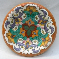 Vintage GOUDA pottery CHARGER - pretty nouveau FLORAL design on WHITE ground - signed to base - 24cm diam - Sold for $61 - 2009