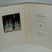 1 x Vol - A BOOK OF WOODCUTS - by Lionel Lindsay, Published by Art in Australia 1922, Limited Edition 144/200, with 14 x stuck-in and loose examples of - Sold for $390 - 2009