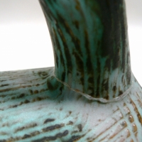 Retro ELLIS Australian Pottery CAT FIGURE with pierce work details, typical greenblack glaze, L19cm (af) - Sold for $195 - 2009