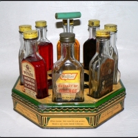 Vintage WATKINS spices & essences P.O.S TIN CADDY with handle 8 original bottles of essence included - some with contents - Sold for $122 - 2009