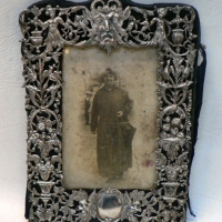 Ornate Victorian Sterling Silver PHOTO FRAME with embossed & pierced work decor, masks, figures, leaves etc  - London 1890 - Sold for $220 - 2009