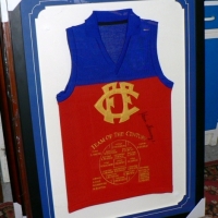 Framed & signed FITZROY Team of the Century GUERNSEY - signed by KEVIN MURRAY in black marker to Guernsey - with COA to back - 88 x 58cm - Sold for $329 - 2009