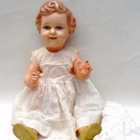 Dressed Vintage Celluloid Character Baby Doll with painted eyes and lips and moulded hair, 54 cm - Sold for $85 - 2009