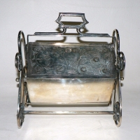 Ornate Victorian silver plated Biscuit Barrel with movable handle to centre that opens the two lids, engraving to lids, c1890 - Sold for $92 - 2009