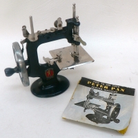 1920's PETER PAN metal toy SEWING MACHINE - Model 0 - complete with clamp, instruction sheet & BOX - Sold for $195 - 2009