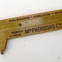 RABONE small slide ruler advertising Mc PHERSONS - Sold for $61 - 2009