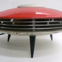 Retro FLYING SAUCER Heater - Made by RAY FLOW - Orangepink enameled top - 3 x tapered legs - Sold for $79 - 2014