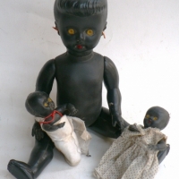 3 x plastic 1950's Hong Kong made BLACK DOLLS with yellow eyes & molded hair One larger sized - approx 31cm L & 2 smaller - approx 11cm L - Sold for $73 - 2014