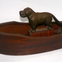 Vintage English made cast metal DOG NUT CRACKER in boat shaped wooden BOWL - Sold for $159 - 2014