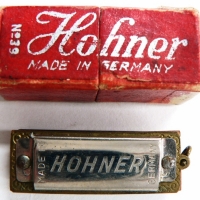 Tiny Harmonica in original box - German made by Hohner - L 35 cm - Sold for $73 - 2014
