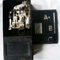 Telephone box coin mechanism in original metal box - Sold for $79 - 2014