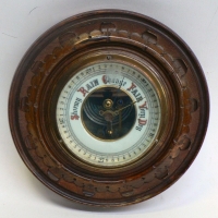 Victorian round  wooden wall BAROMETER with carving to front - 185 cms D - Sold for $61 - 2014