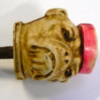 1920's cream novelty BULLDOG corkscrew - wearing a red bellboy hat - Sold for $79 - 2014
