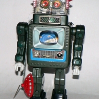 Early 1960's tin battery operated Television ROBOT - grey with red circular antenna to top of head - 38cms Total H, marks include made in Japan - gc   - Sold for $695 - 2014