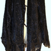 c1910 fab Black embroidered net overjacket with side sleeves, satin trim & tie to front (Syme) - Sold for $232 - 2014