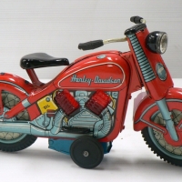 Late 1950's  Nomura Toys red tin HARLEY-DAVIDSON Motor bike - friction powered - gc - Sold for $403 - 2012