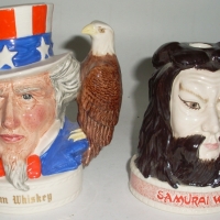 2 x Royal Doulton liquor containers - Jim Beam Samurai Warrior & Uncle Sam with eagle handle, The International collection - Sold for $92 - 2012