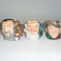 3 x Royal Doulton Character Jugs - The Poacher (6515, 6cms H, Neptune (D6555), 65cms H & Merlin (D6543), 7cms H - Sold for $73 - 2012