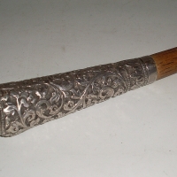 Victorian Swagger stick with pretty embossed silver top - Sold for $85 - 2012