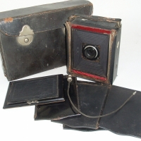 Early 1900's The Cameo PLATE CAMERA, made by Benetfink London, with glass plates and leather carry case - Sold for $146 - 2012
