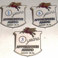3 x vintage Vacuum Oil Co enamel  Safe Driver  award badges - 15, 20 & 30 years - Sold for $73 - 2012