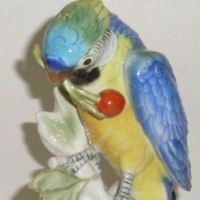 German Porcelain RUDOLSTADT VOLKSTEDT Porcelain Figure - Parrot on Branch w Cherries on Stems - Lovely colourful glazes, marked to base, Perfec - Sold for $159 - 2012