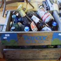 Old wooden 'Tarax' crate & contents of vintage bottles inc - Schweppes, Cottee's, Marchant, Tarax soft drink bottles, James Dickson bottle with emboss - Sold for $67 - 2012