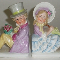 Pair VICTORIAN china bookends - matching 'Crinoline girl' and boy - marked 'Germany' to base - Sold for $79 - 2012