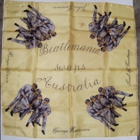 1960's silk BEATLES Scarf - Beatlemania sweeps Australia with all 4 names to sides - lemon colouring with grey tone Beatle members - 67cm x 67cm - Sold for $61 - 2012