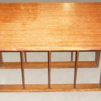 Retro 1960/70's Coffee table with splayed legs, gold capped feet & record rack underneath - Sold for $55 - 2012