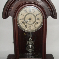 c1900 Ansonia mantle Clock with pendulum & key, brass bust decoration to top - Sold for $128 - 2012