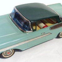 1950's Japanese Yonezawa Toys tin friction 2 door Coupe, fab square shape wings to back, poss Ford - exc - Sold for $329 - 2012