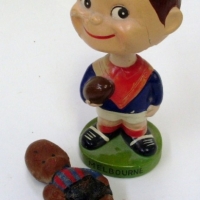 2 x Vintage AFL NOVELTY items - Melbourne Football Club bobble head figurine 16cm (H) + Port Melbourne rubberoid kewpie style footballer figurine - Sold for $85 - 2012