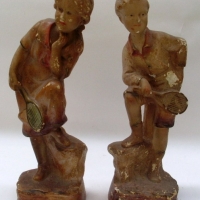 Pair of Edwardian chalkware  figurines - boy & girl with tennis racquets - 31cms H - Sold for $67 - 2012