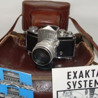 IHAGEE EXAKTA 35mm SLR camera with Ziess 50mm lens waist level viewfinder, and 2 x vintage EXAKTA books, heaps booklets, accessories, in leath - Sold for $110 - 2012