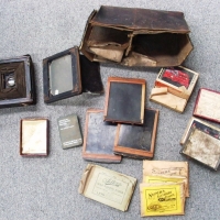 Box lot incl. Kodak Pony Premo No 4 plate camera, boxes Austral Standard dry plates, wooden glass plate holders, pkts Kodak Gaslight paper, qty exposed - Sold for $73 - 2012