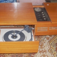 Retro AWA Monarch Stereogram in low coffee table style cabinet, part sliding top and record player in pullout drawer - Sold for $92 - 2012