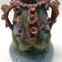 Art nouveau amphora vase - applied branch handles and flowers to top section, mark to base, 14cm high - Sold for $67 - 2012