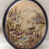 c1920 Satsuma brooch - oval shape approx 58mm in length -  snow covered mountain landscape with flowers to the foreground - Sold for $55 - 2012
